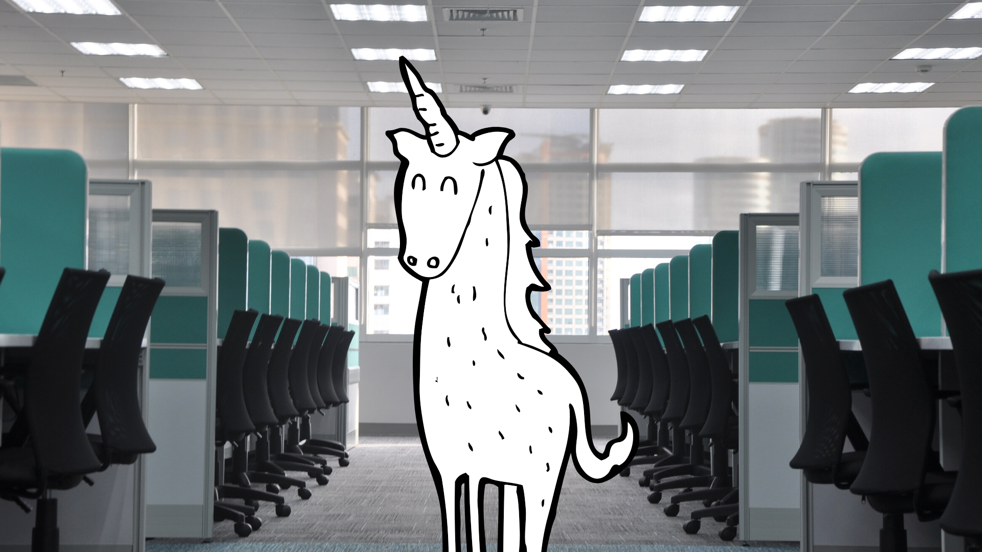 A white unicorn illustration in an empty office picture